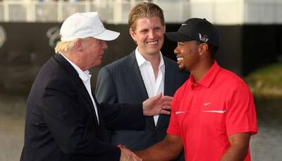 US President-elect Donald Trump tees up for golf with Tiger Woods