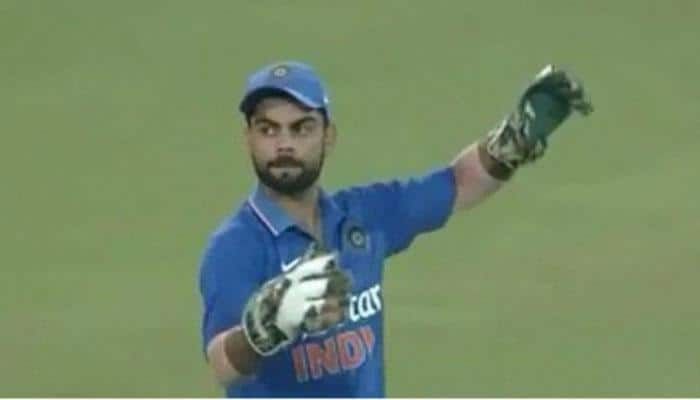 When Virat Kohli took on wicket-keeping as MS Dhoni went for toilet break – Video