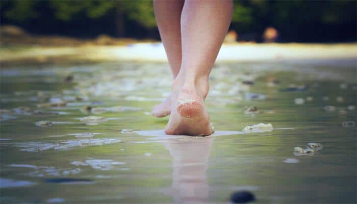 Walking barefoot on green grass will help you THIS way!