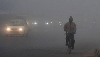 Dense fog, chilly New Year awaits north India