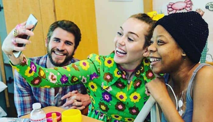 Miley Cyrus and Liam Hemsworth's 'Happy Hippie' New Year celebrations at children's hospital
