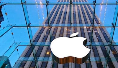 Apple cuts Tim Cook's pay as iPhone sales fall first time
