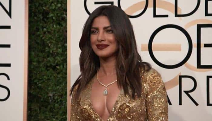 Golden Globes 2017: Priyanka Chopra shimmers in gold, looks stunning – WATCH