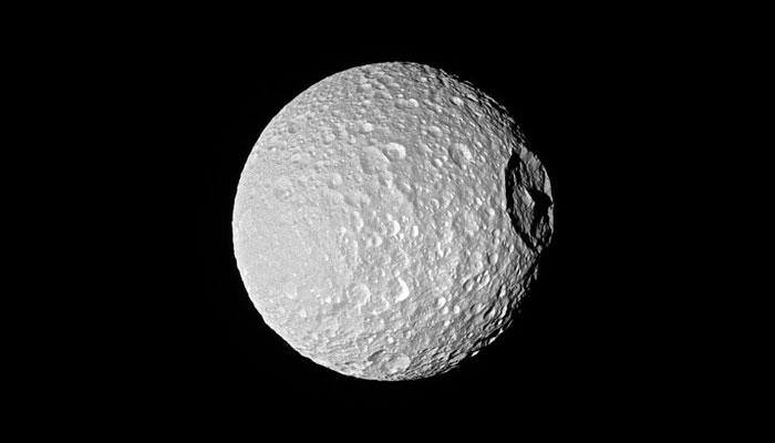 Saturn's moon Mimas' 'Mount Everest' stands tall in Cassini's latest image!