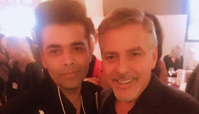 Totally Clooed! Karan Johar meets George Clooney; poses for a click!