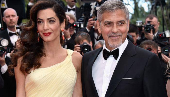 Amal Clooney&#039;s baggy floral smock sparks pregnancy rumours!