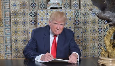 Donald Trump era begins with Obamacare rollback, protests 