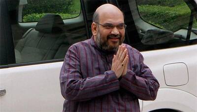 UP polls: Amit Shah releases BJP manifesto; promises free laptops with 1 GB data, anti-Romeo squads to check eve-teasing – See list here