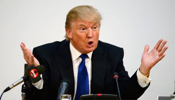 Trump bars people of seven Muslim-majority nations from entering US, orders new vetting rules