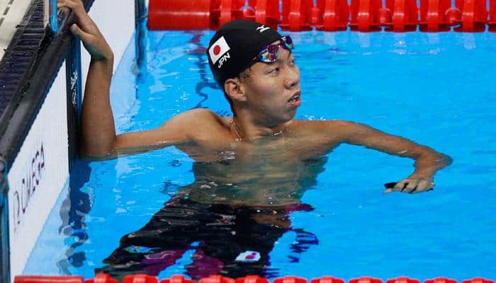 Japan`s Ippei Watanabe sets breaststroke world record in swimming