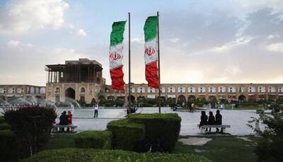 Iran summons Swiss envoy over Trump visa ban