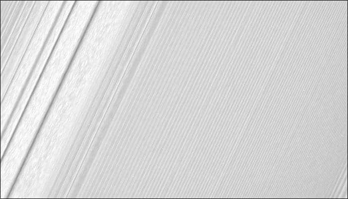 Saturn's rings dazzle in a close-up! NASA's Cassini delivers one of its best 'ring-grazing' images of the planet