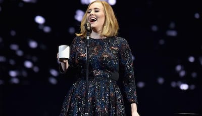 Adele broke her 'Album of the Year' Grammy in two, dedicates it to Beyonce!