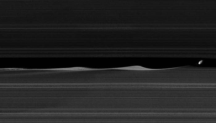 Saturn&#039;s moon Daphnis mosaic made from Cassini images is incredibly stunning – See pic
