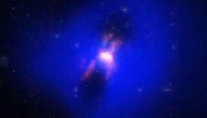 Astronomers observe black hole producing cold, star-making fuel from hot plasma jets