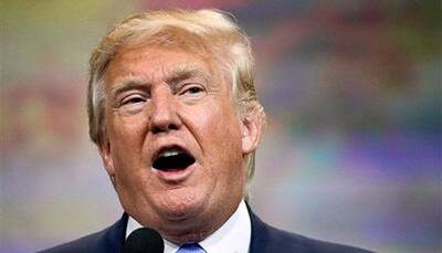 Donald Trump again attacks media as 'fake news' at Florida rally