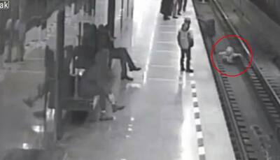 CCTV captures man jumping on tracks to save 8-year-old Russian kid, video goes viral