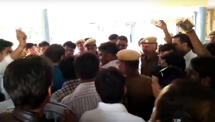 &#039;Gundagardi&#039; caught on camera: Rajasthan BJP MLA&#039;s husband, supporters slap police officer