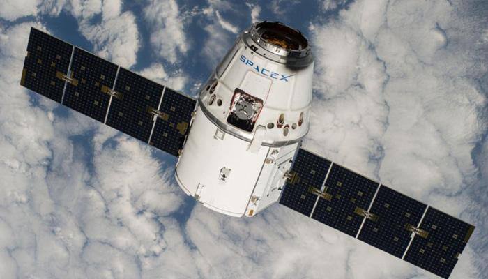 SpaceX Dragon cargo craft to dock with space station today