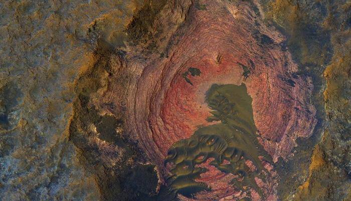 Layers and dark dunes on Martian surface as seen by HiRISE camera