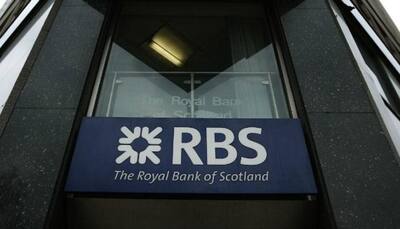 RBS posts ninth straight annual loss on ''sins of the past''