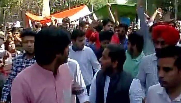 Ramjas College clash: ABVP takes out &#039;Tiranga march&#039;, counter-marches lined up; dissent is agreeable not disintegration, says govt 