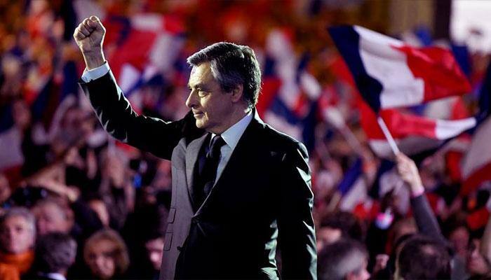 French right wing presidential candidate Francois Fillon faces &#039;fake job&#039; charges but stays in campaign