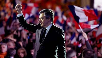 French right wing presidential candidate Francois Fillon faces 'fake job' charges but stays in campaign