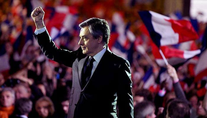 French right wing presidential candidate Francois Fillon faces 'fake job' charges but stays in campaign