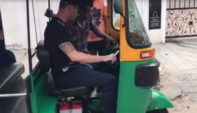 WATCH: Michael Clarke drives auto-rickshaw on Bengaluru roads like a pro ahead of 2nd India-Australia Test