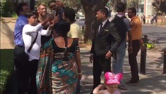 WATCH: David Warner's daughter Ivy throws her candy after fans surround him for selfies in Bengaluru