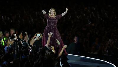 Adele confirms she is 'married now' to long-term beau Simon Konecki