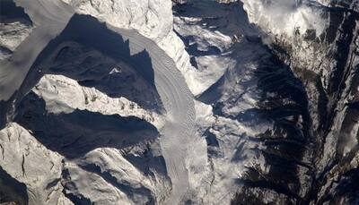 Alpine glaciers look a bit like whipped egg whites from space station! 
