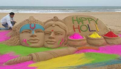 Odisha artist creates Radha Krishna sand sculpture for Holi