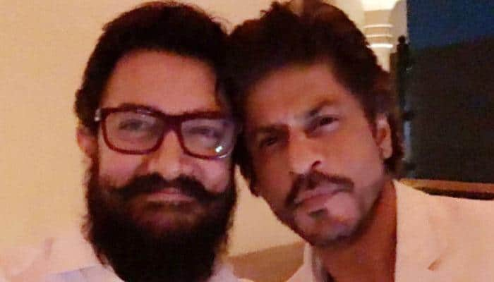 Shah Rukh Khan strikes a pose with Aamir Khan again! See PIC