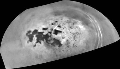 NASA's Saturn probe reveals nitrogen bubbles creating fizzy patches on Titan's lakes and seas!