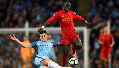 Premier League: Manchester City held to 1-1 draw by Liverpool; Tottenham beat Southampton 2-1
