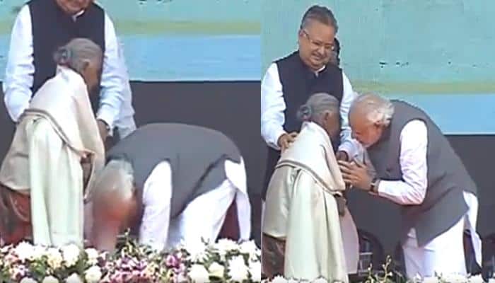 PM Narendra Modi touches feet of 104-year-old lady who built toilets by selling her goats