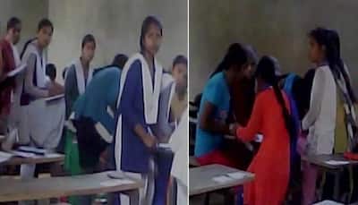 Caught on Camera! Mass cheating during UP Board exam at Ballia; students take exam with open books 