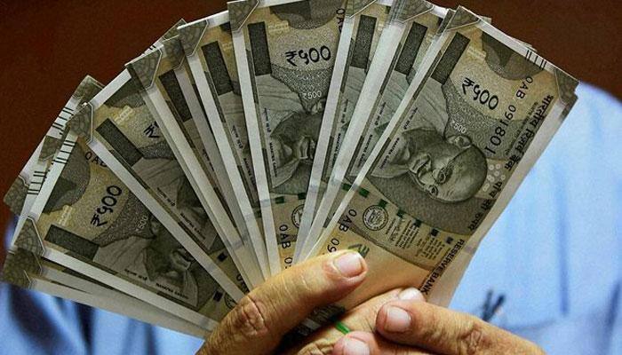 Rupee retreats from 17-month high, down 14 paise at 65.44 vs USD