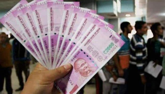 Government removes 1% tax on cash payments of over Rs 2 lakh 