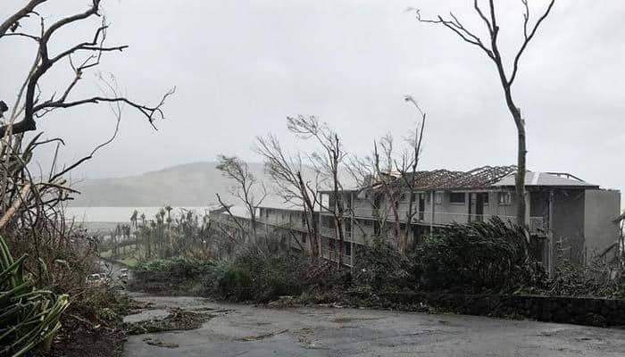 Australia to begin evacuating cyclone-hit island resorts