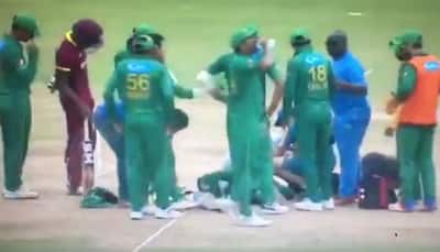 WATCH: Ahmad Shahzad rushed to hospital after HORRIFIC on-field collision during 2nd T20I vs WI