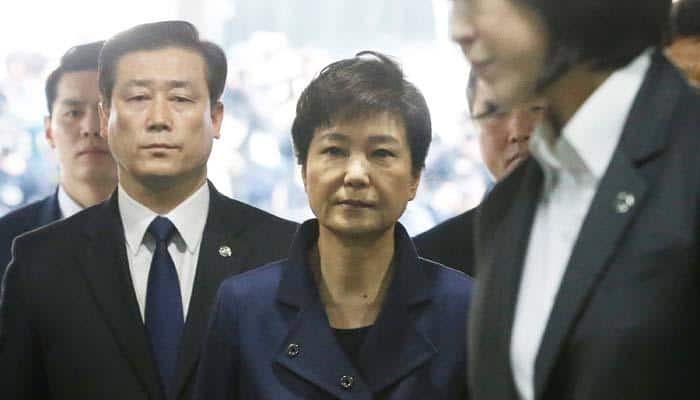 Ousted South Korean leader behind bars after arrest on bribery charges