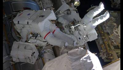 Spacewalkers successfully connect adapter for commercial crew flights - Watch