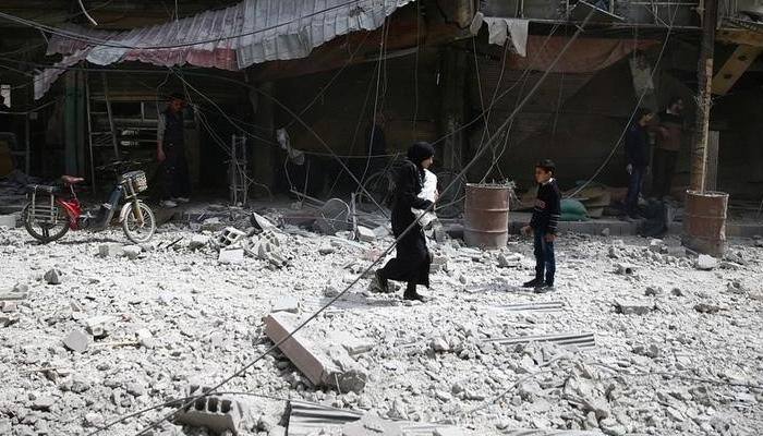 Syria gas attack kills 58; top EU diplomat says 'Assad has primary responsibility'