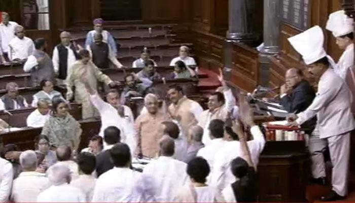 Huge uproar in Rajya Sabha over EVM tampering row; BJP slams Opposition, says go to EC, don't waste Parliament time