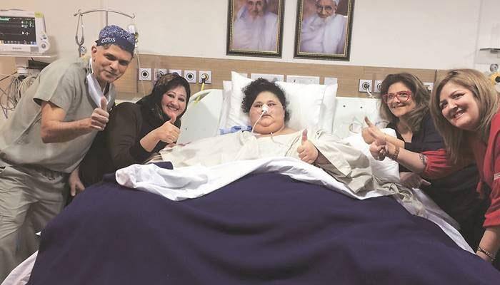 World's heaviest woman Eman touches her face with her hand, blows kiss to doctor
