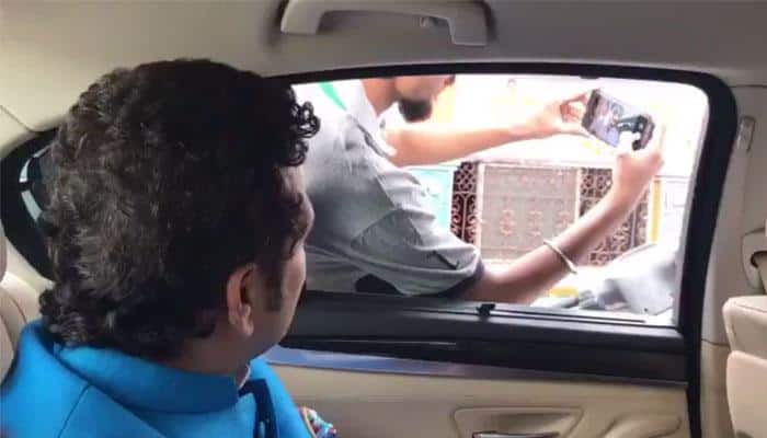 Sachin Tendulkar teaches road safety lessons as passers-by stop to take selfie – Watch Video