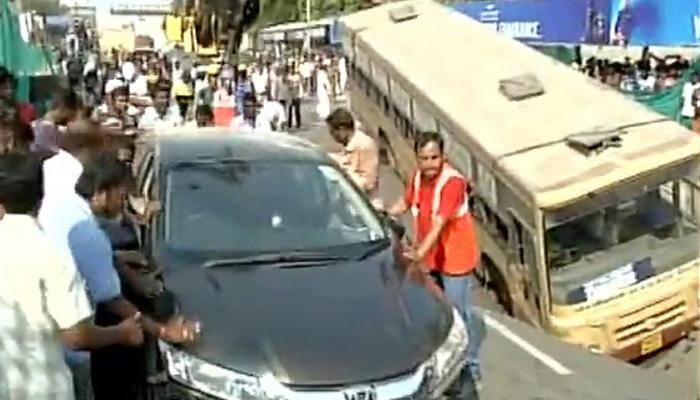 Bizarre! Bus, car plunge into huge hole in Chennai as road caves in